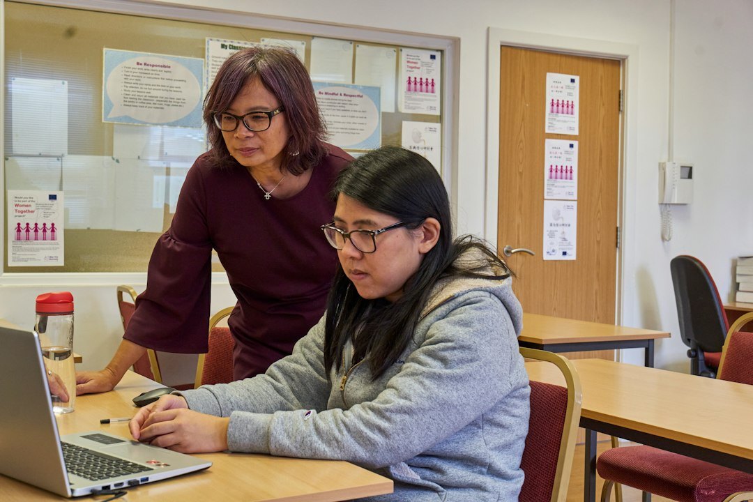 mentor explaining code to student