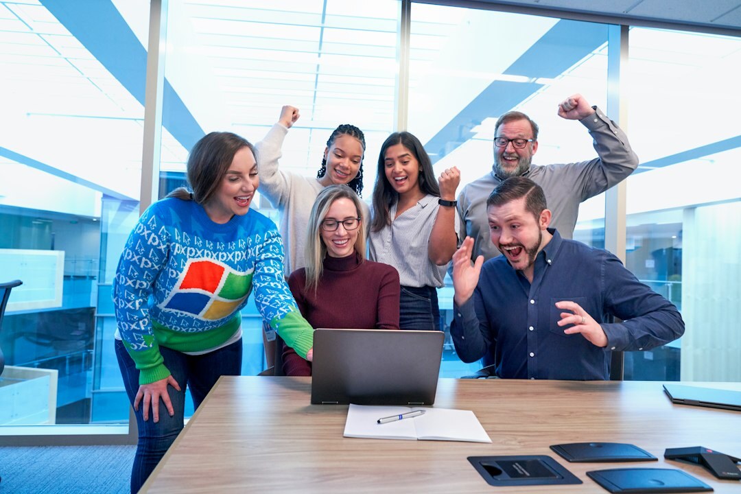 diverse group celebrating project success